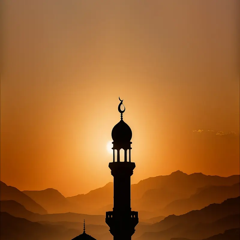 اليوم الحادي والعشرون من شهر رمضان - دعاء، عبارات و تهنئة مع صور, صورة ظلية هادئة لمئذنة أمام غروب الشمس الذهبي، مع طبقات من الجبال في الخلفية.